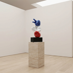 Sculpture of two hands, one blue and one red, on a pedestal in a minimalist gallery setting.